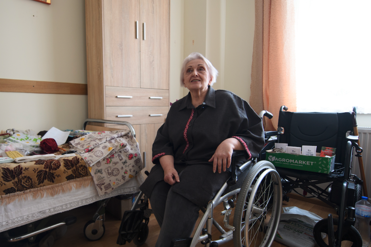Woman in her bedroom at shelter in Ukraine