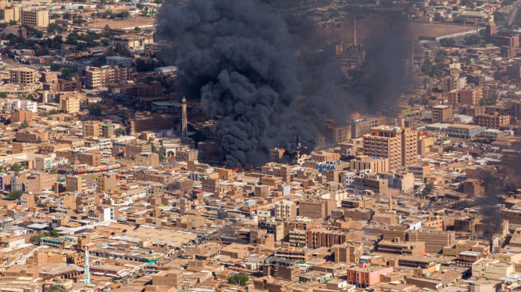 Fire in Amdurman market, an ancient market in Khartoum, Sudan, caused by fighting between the SAF and RSF, May 2023