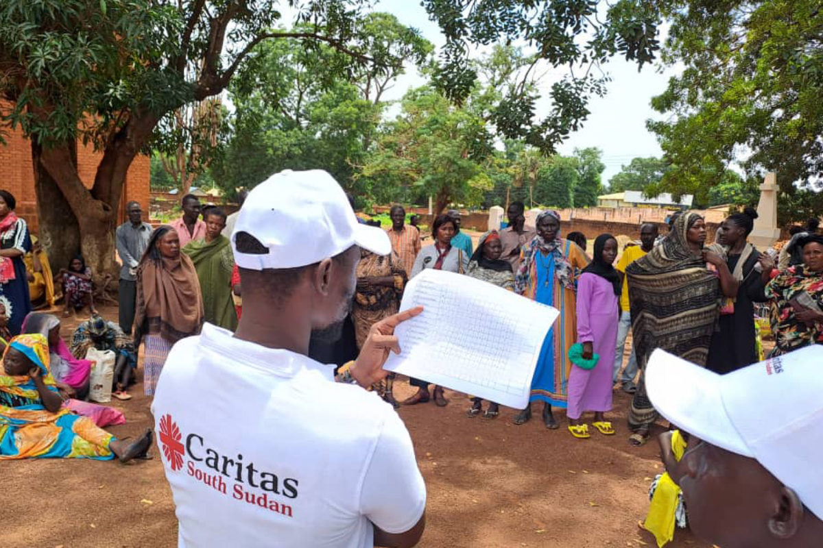 Caritas South Sudan staff conduct a registration exercise amongst new arrivals from Sudan