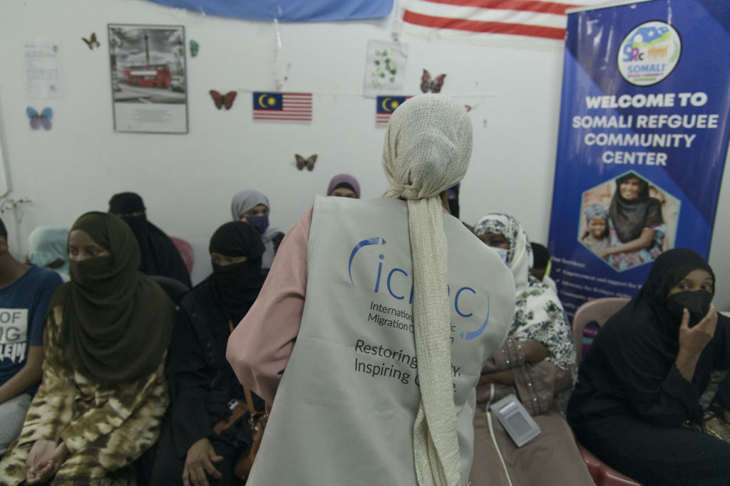 An ICMC Refugee Protection Corps volunteer facilitates an information session for the Somali refugee community in Kuala Lumpur, Malaysia 