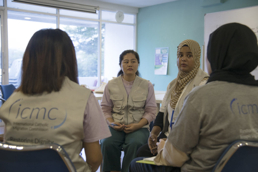 Staff, volunteers, and survivors participate in an ICMC GBV peer support group in Kuala Lumpur, Malaysia 